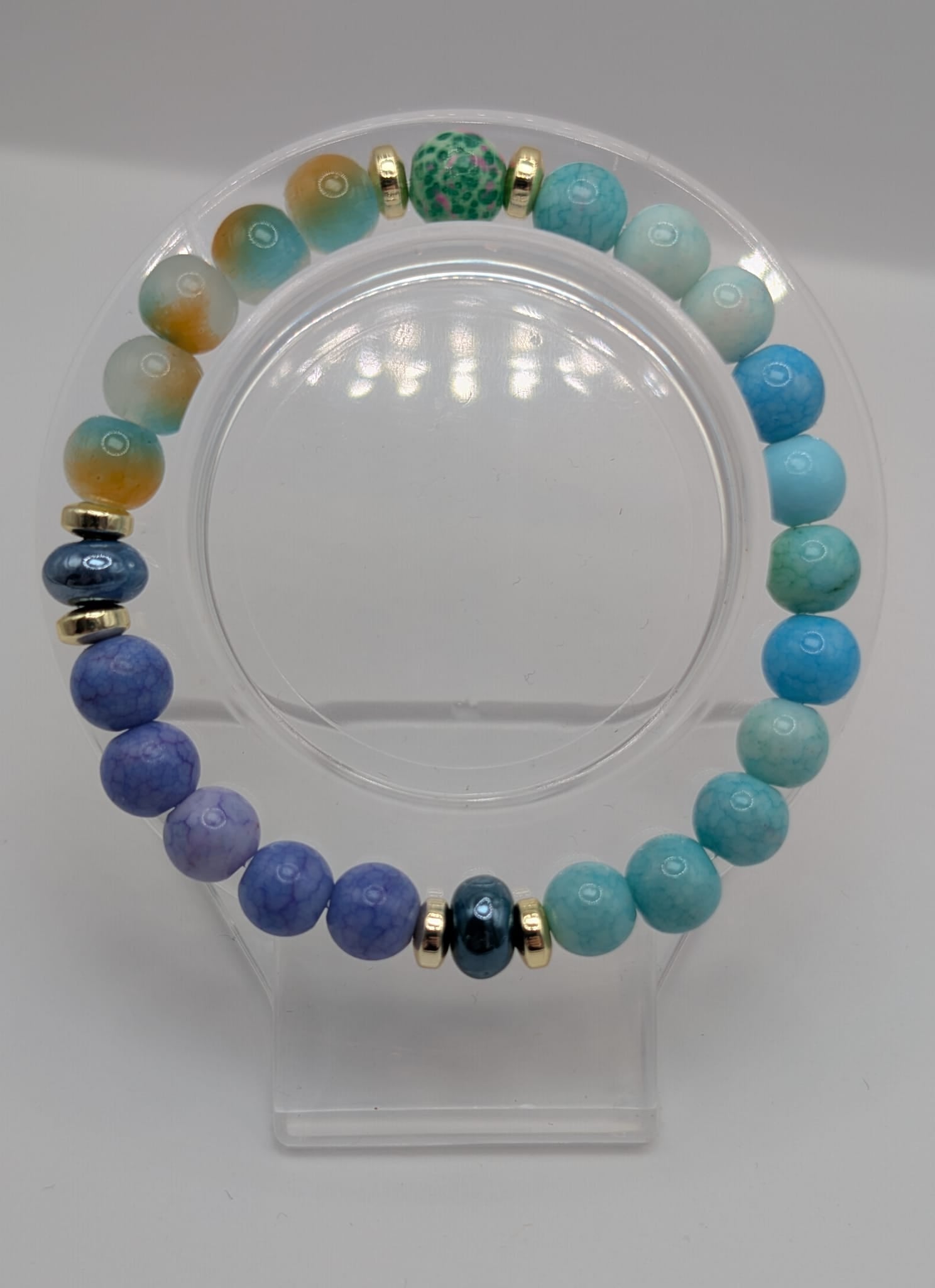 Handgemachtes Armband in Blau, Türkis & Orange