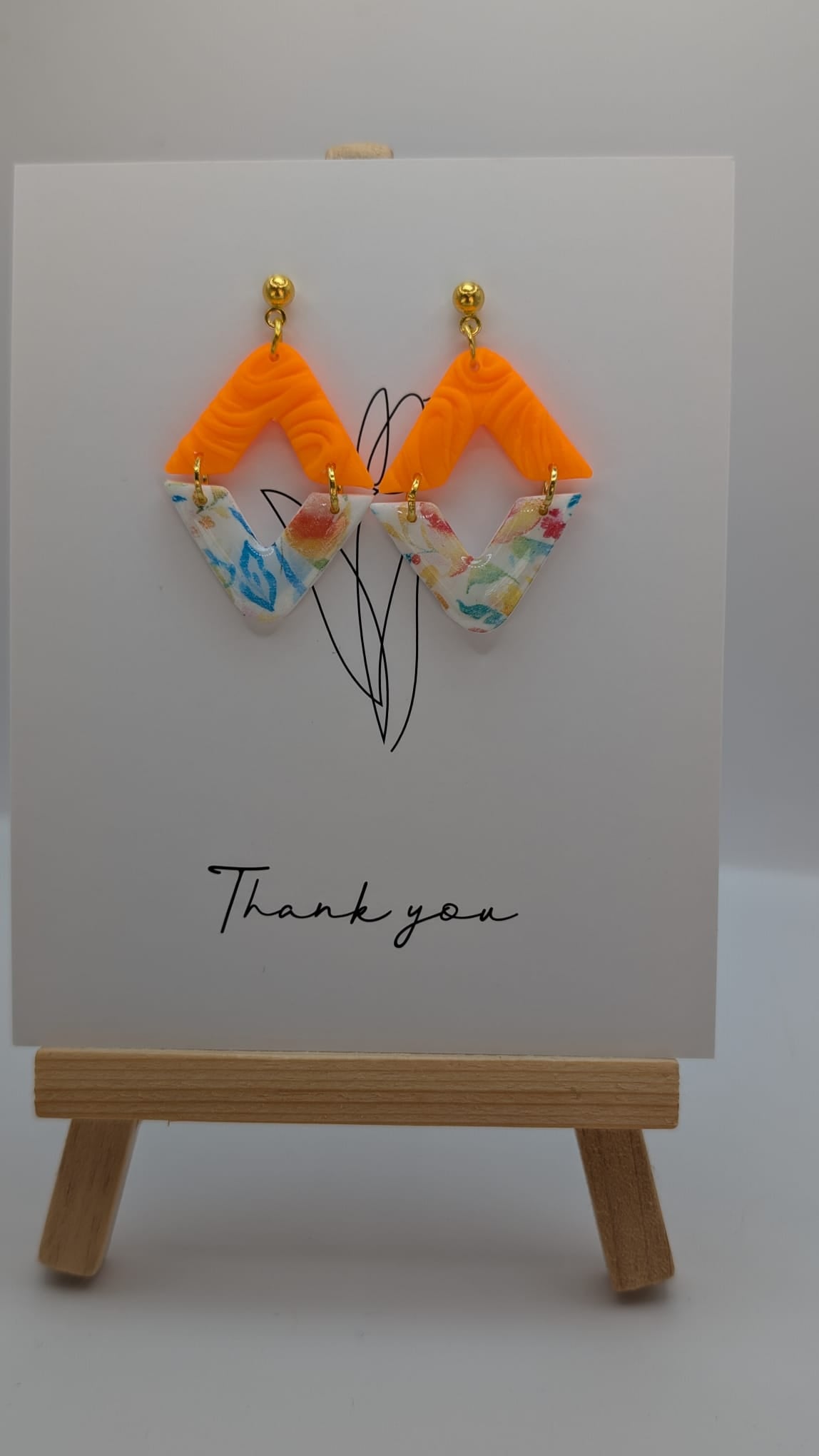 Geometrische Ohrringe in Orange – Handmade Statement Schmuck

